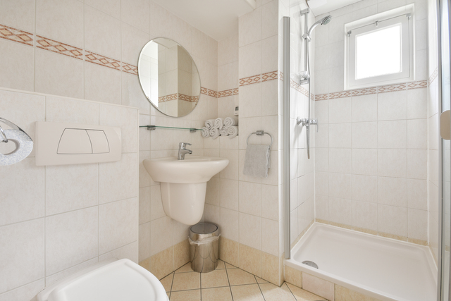 Attached Bathroom with Clean Shower
